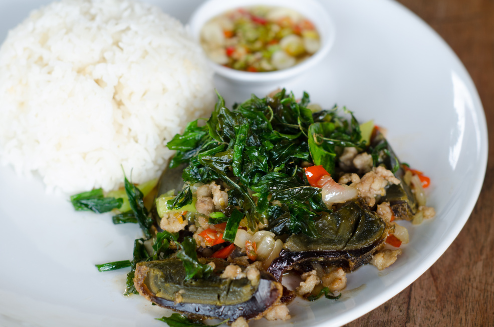 Fried century egg with crispy holy basil